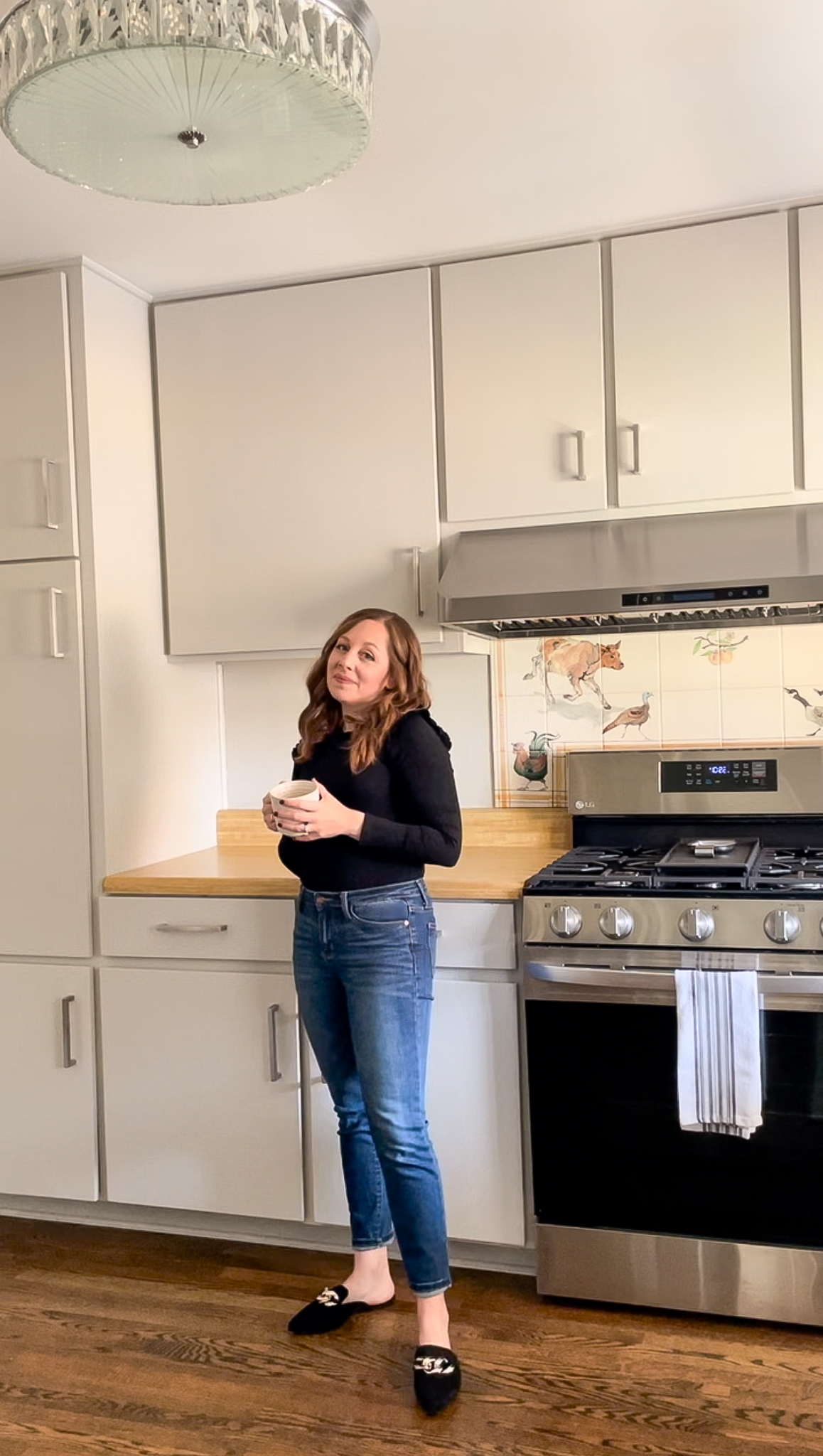 Brit Kolo the Comeback standing in kitchen with coffee